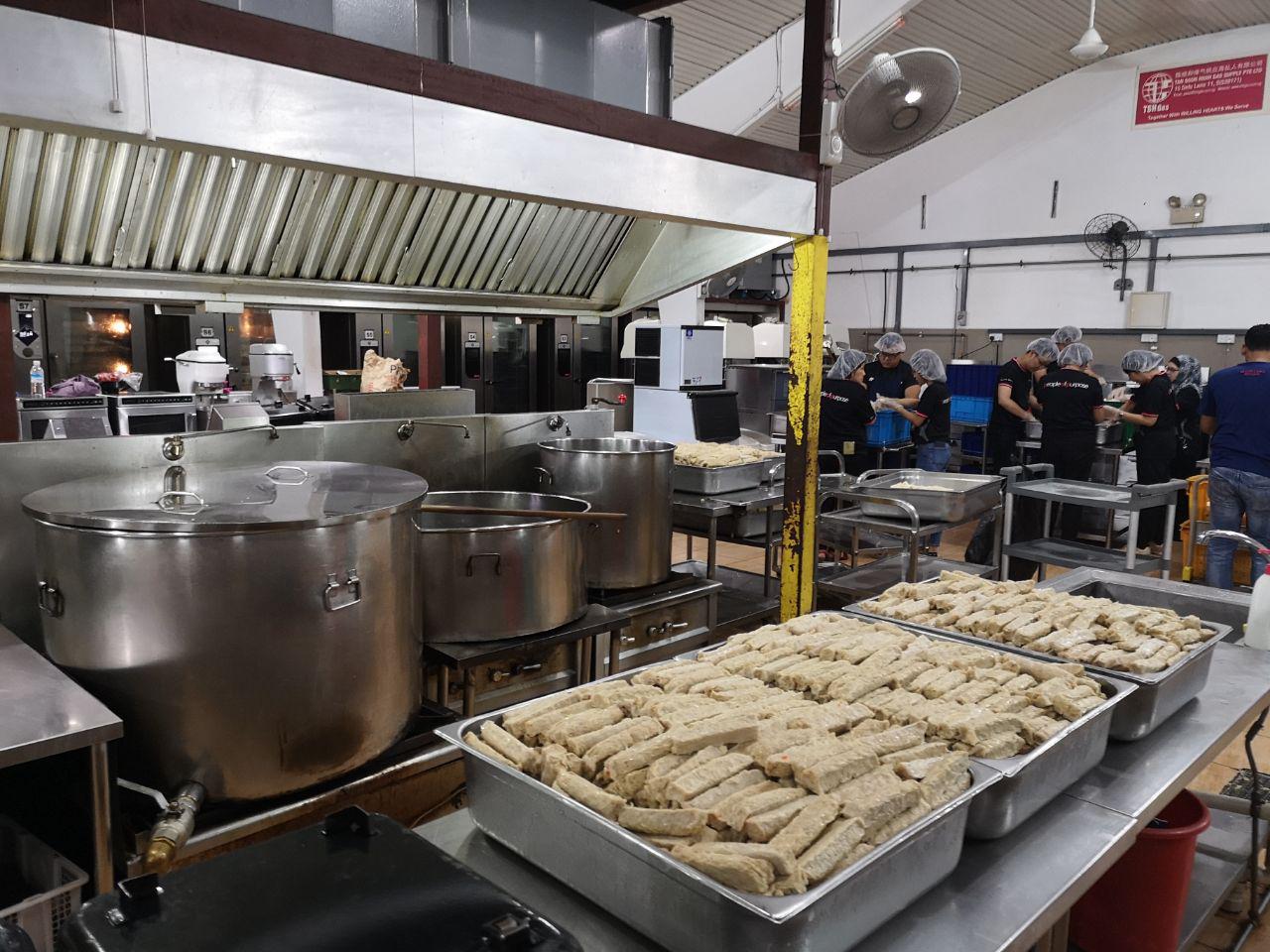 The kitchen, where volunteers assist cooks with the preparation of meals.