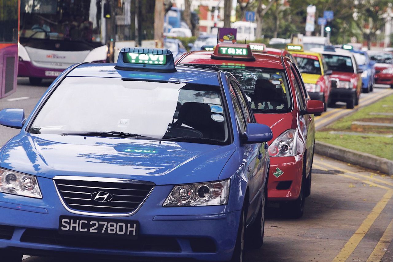 Which Taxi Company’s Agenda is The Straits Times Pushing?