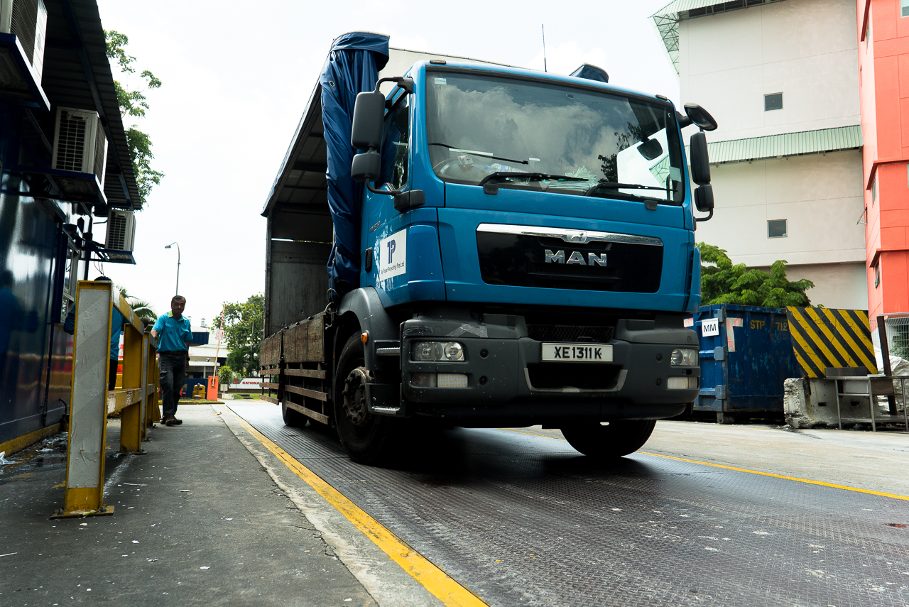 Trucks being weighed on a digital scale that is accurate to the nearest 1kg