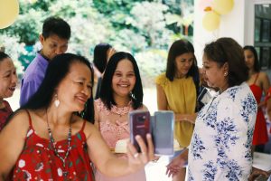 After 27 Years in Singapore, This Domestic Helper Wants Fellow Filipinos to Spend More Wisely