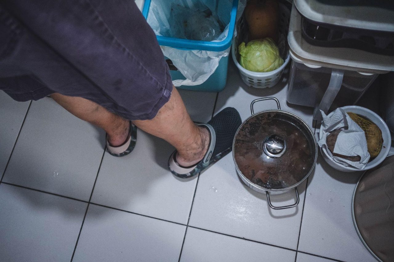 With limited stovetops, pots are sometimes placed on the floor.