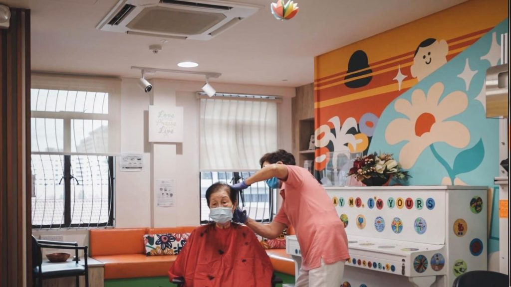 Madam Cheok visits once a week to give haircuts to those in need. 