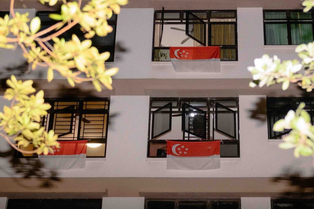 What It Means to Still Fly a Singapore Flag Outside Your Window Every National Day