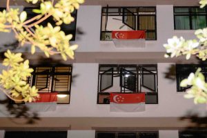What It Means to Still Fly a Singapore Flag Outside Your Window Every National Day